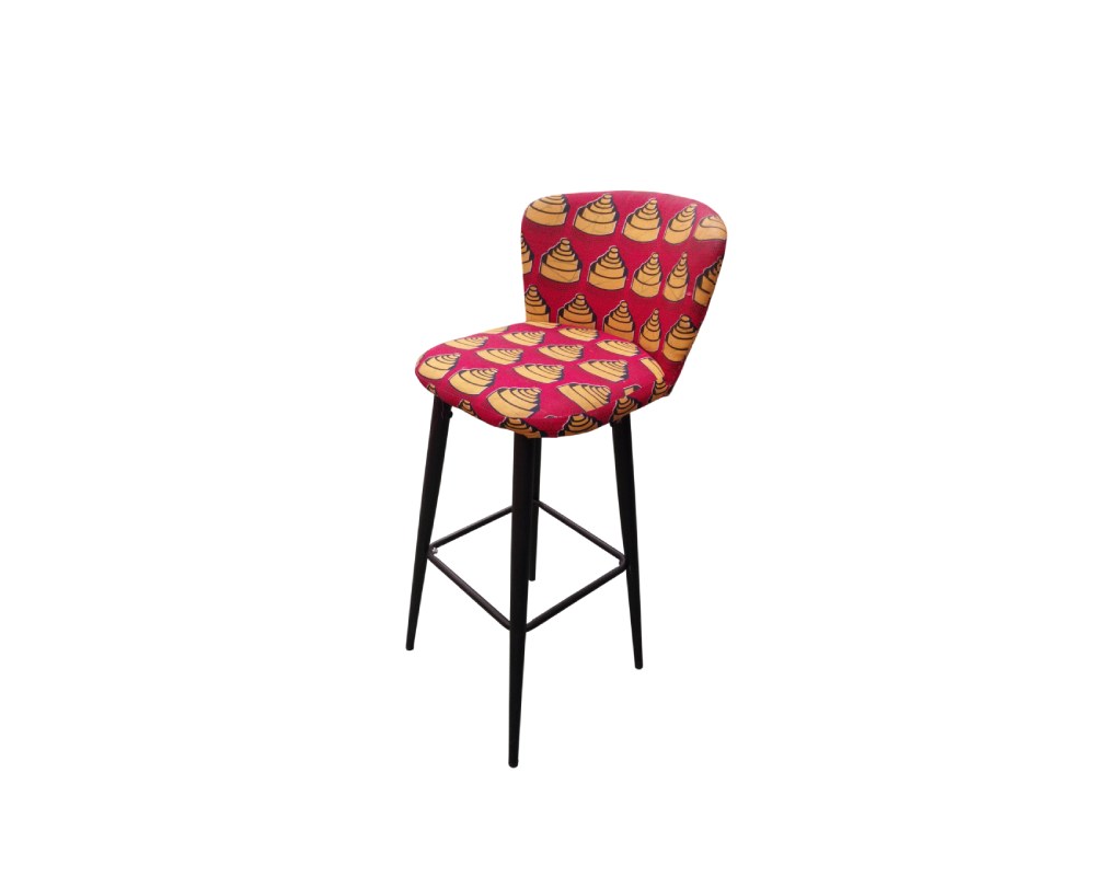 This high stool from the Seletti Toiletpaper collection features an eye-catching shell print on a vibrant red background; available for hire for events, advertising, films and TV series