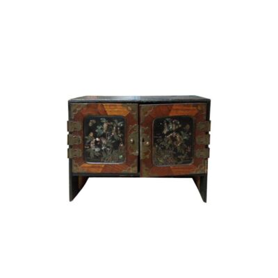 A horizontal wooden cabinet, featuring two front doors decorated with dark panelling and iridescent floral inlays; available for hire for events, advertising, films and TV series