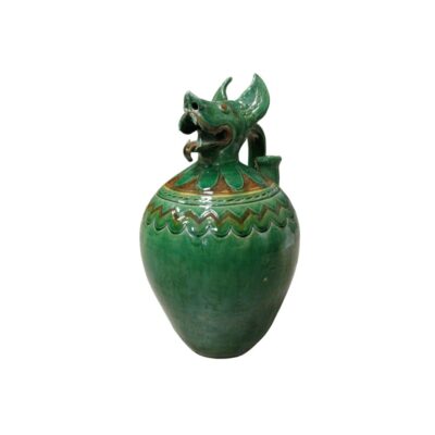 A ceramic vessel with a glossy green-toned glaze, characterised by a globular body and a neck sculpted in the shape of an animal’s head or a mythological creature with an open mouth and prominent ears; available for hire for events, advertising, films and TV series