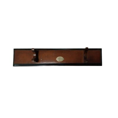 An elongated wall-mounted display stand, made from wood in shades of brown and dark colours, specifically designed to display a Japanese-style sword; available for hire for events, advertising, films and TV series