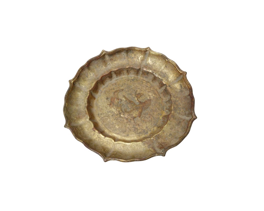 Metal tray with an antique gold finish, featuring a wavy, petal-shaped outer rim; available for hire for events, advertising, films and TV series
