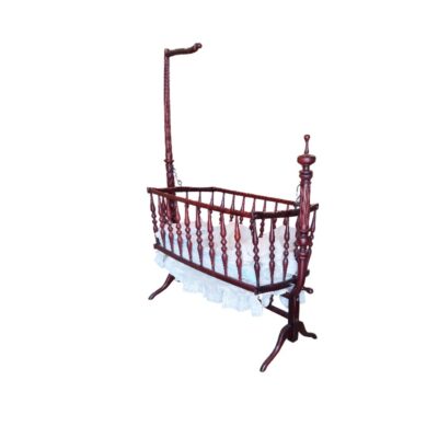 This antique rocking cradle is made of mahogany and features a canopy; available for hire for events, advertising, films and TV series