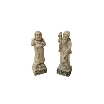 Two figurines carved from a material that mimics the appearance of ivory. They depict traditional figures from Eastern iconography, with meticulous detail in their clothing, facial expressions and accessories; available for hire for events, advertising, films and TV series