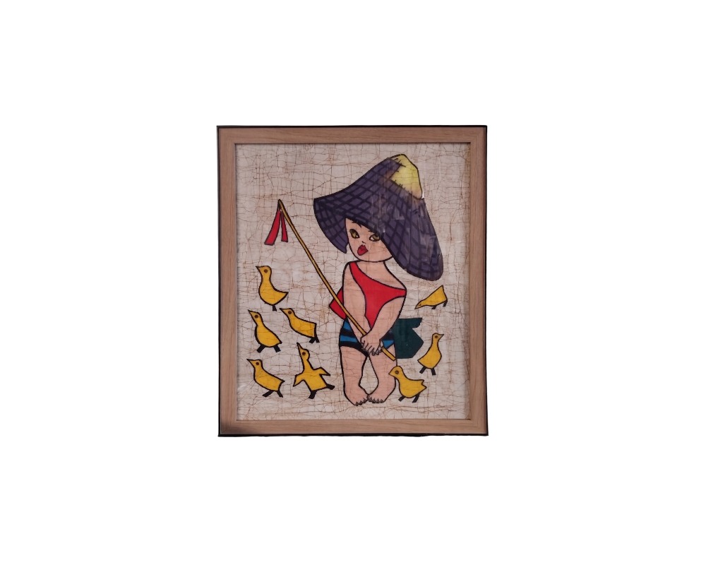 A vertically oriented, wood-framed artwork featuring an illustration on fabric depicting a child wearing a traditional wide-brimmed hat and carrying a walking stick, leading a group of yellow ducks. Available for hire for events, advertising, films and TV series.