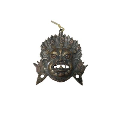 protective deity (Dharmapala), recognisable by his fierce features, bulging eyes, bared fangs and a crown of flames – elements designed to strike fear into evil spirits and protect the practitioner; hire for events, advertising, films and TV series