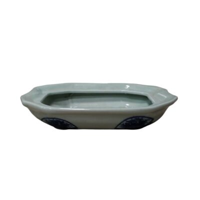 Rectangular porcelain tray with bevelled corners, giving it an octagonal shape; available for hire for events, advertising, films and TV series