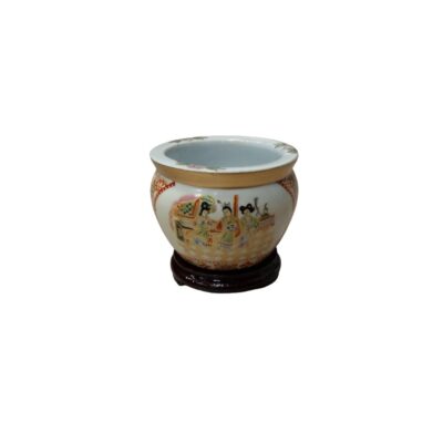 porcelain plant pot with a globular body and a wide, flat rim  available for hire for events, advertising, films and TV series
