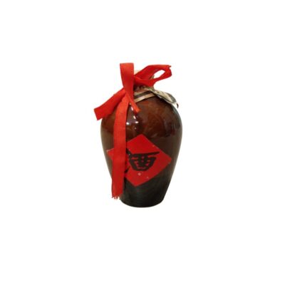 Traditional ceramic bottle containing Chinese spirits, commonly known as baijiu or rice wine; available for hire for events, advertising, films and TV series