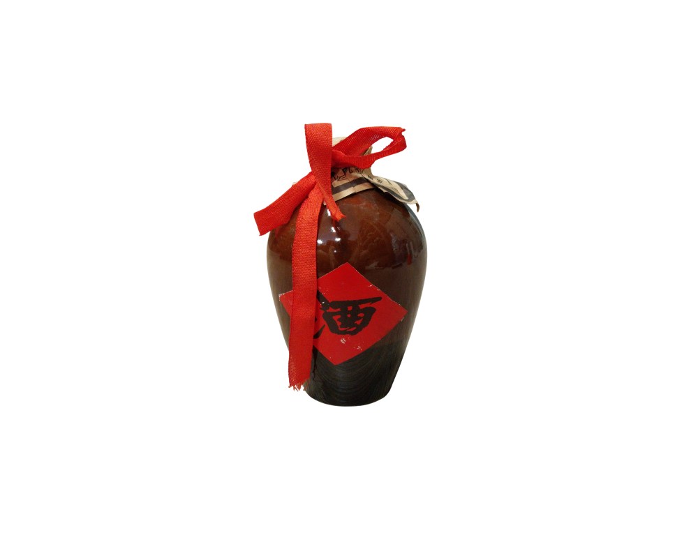 Traditional ceramic bottle containing Chinese spirits, commonly known as baijiu or rice wine; available for hire for events, advertising, films and TV series