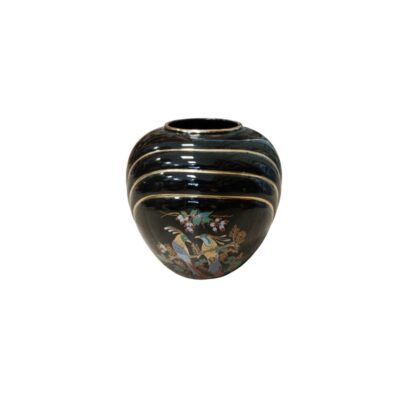 A ceramic vase with a globular body and a glossy black finish, featuring gold horizontal lines running across the top and a delicate polychrome illustration on the front depicting birds perched on flowering branches; available for hire for events, advertising, films and TV series