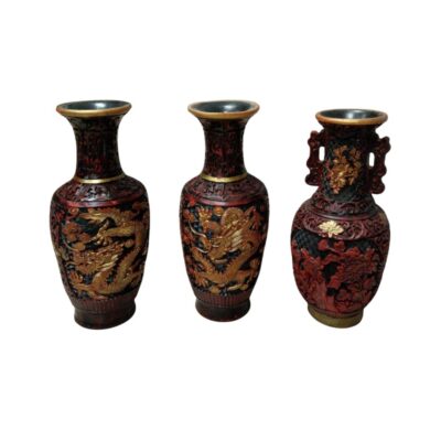 comprising three traditionally designed vases with intricate detailing in dark, red and gold tones; available for hire for events, advertising, films and TV series