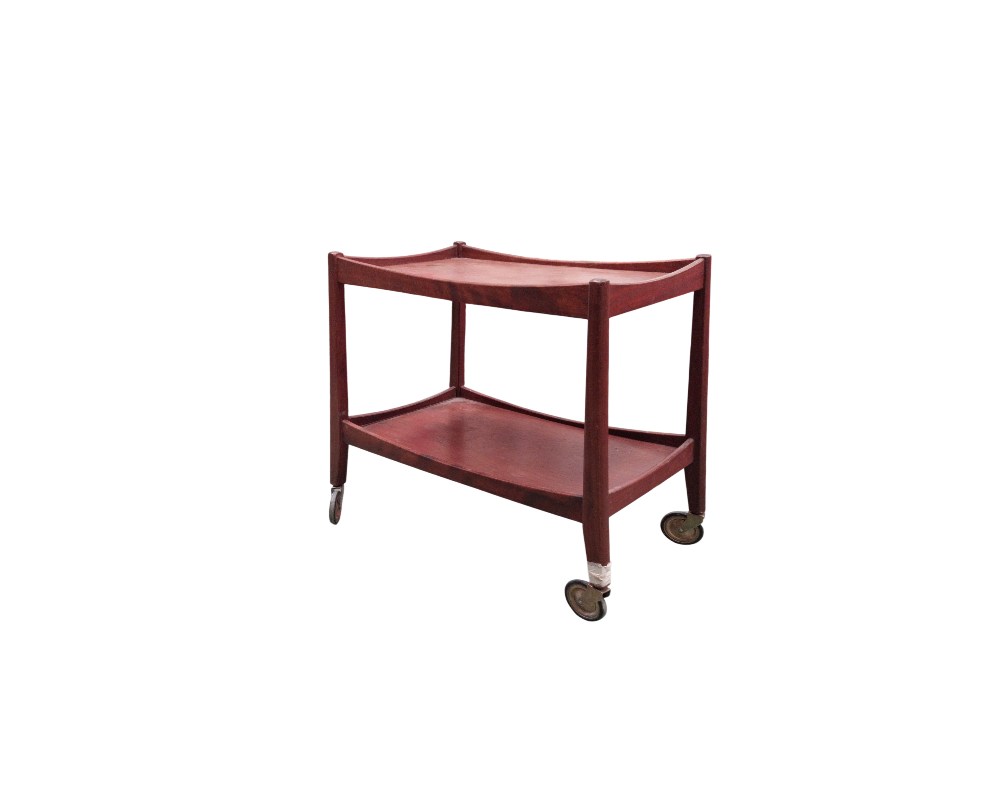 This Opal Möbel service trolley from the 1960s is made of teak and features a functional Scandinavian design; it is fitted with practical wheels and is available for hire for events, advertising, films and TV series.