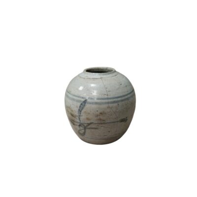 A ceramic vase with a compact, globular body and a narrow mouth, finished in light, rustic tones featuring fine horizontal lines and a stylised pictorial motif painted in shades of blue and grey; available for hire for events, advertising, films and TV series