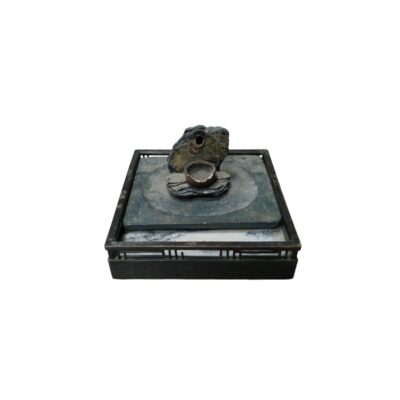 A decorative set in an oriental or Zen style, combining a rectangular dark wooden base with intricately carved railings, upon which are arranged veined stone slabs and a central sculptural arrangement of natural rocks, alongside a small rustic bowl. Available for hire for events, advertising, films and TV series.