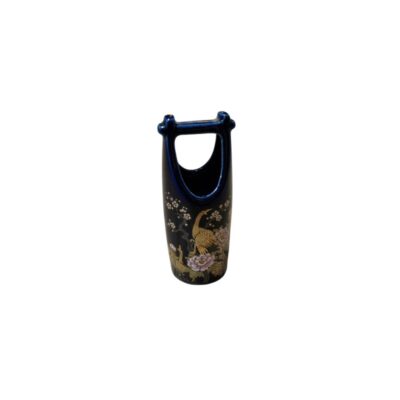 a ceramic container with a distinctive arched handle at the top, giving it a shape similar to a small basket; available for hire for events, advertising, films and TV series