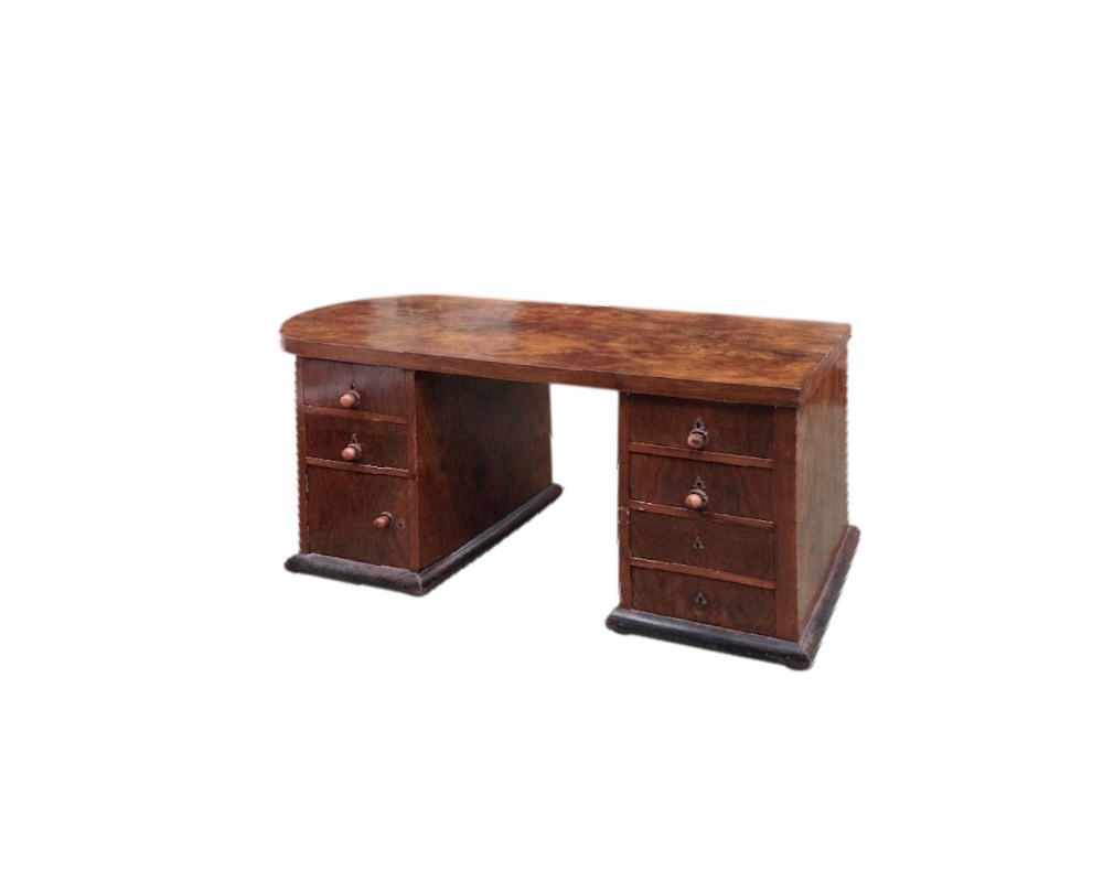 Art Deco walnut and mahogany desk from the 1920s, featuring functional drawers and a polished finish; available for hire for events, advertising, films and TV series