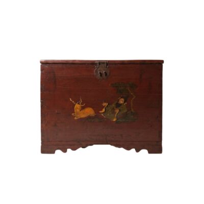 a large wooden chest, characterised by a dark reddish finish that highlights the natural grain of the wood. The front of the hinged lid is decorated with a painted scene depicting a figure seated beside a stag, a traditional iconographic motif that evokes serenity and longevity