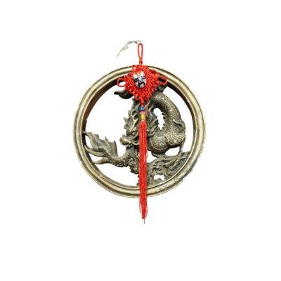 A decorative wall piece consisting of a circular metal frame with a detailed central relief depicting a dragon, an iconic figure from Eastern mythology; available for hire for events, advertising, films and TV series