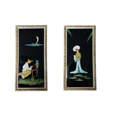 A pair of vertical paintings with a glossy black background and a gold moulded frame. The pieces feature illustrations with a traditional Asian theme, depicting a fisherman with a net and a woman under a parasol. They are decorative wall pieces that are ideal for adding a touch of classic style and visual contrast to interior décor.