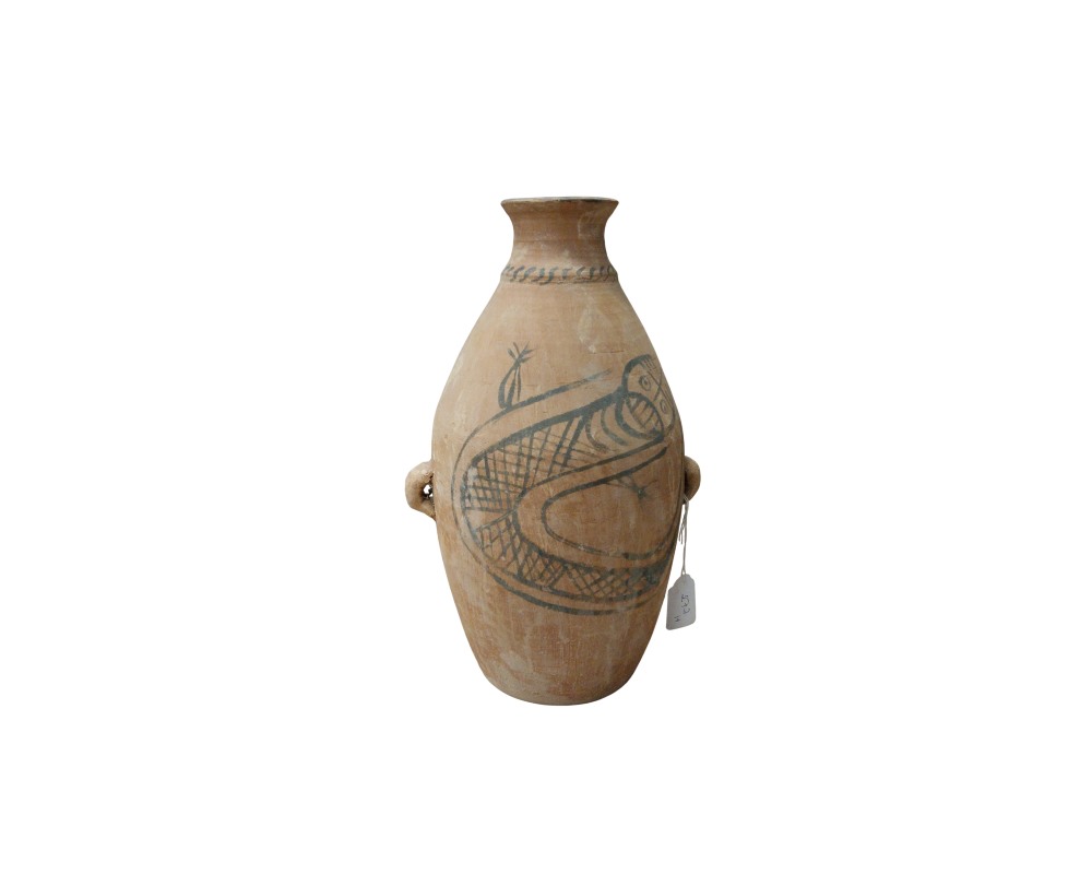 A terracotta vase in earthy tones, with an elongated body and narrow neck, featuring two small side handles and a painted decoration in dark tones depicting the stylised figure of an animal with a scaled pattern; available for hire for events, advertising, films and TV series