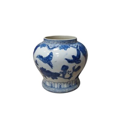 A porcelain vase with a globular body, a short neck and a slightly flared base. It features traditional decoration in cobalt blue on a white background, a technique very characteristic of Oriental ceramics. Available for hire for events, advertising, films and TV series.