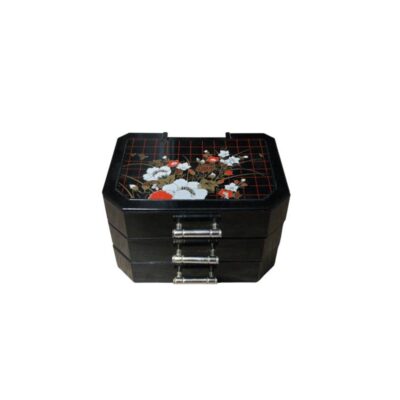 A horizontal organiser with an octagonal design, finished in dark tones and featuring a top cover decorated with a geometric grid and a detailed floral motif in shades of white and red; available for hire for events, advertising, films and TV series