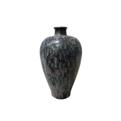 A ceramic vase with a slender body and short neck, characterised by an intricate glazed finish that blends dark tones with reddish and whitish highlights to create a dripping effect; available for hire for events, advertising, films and TV series