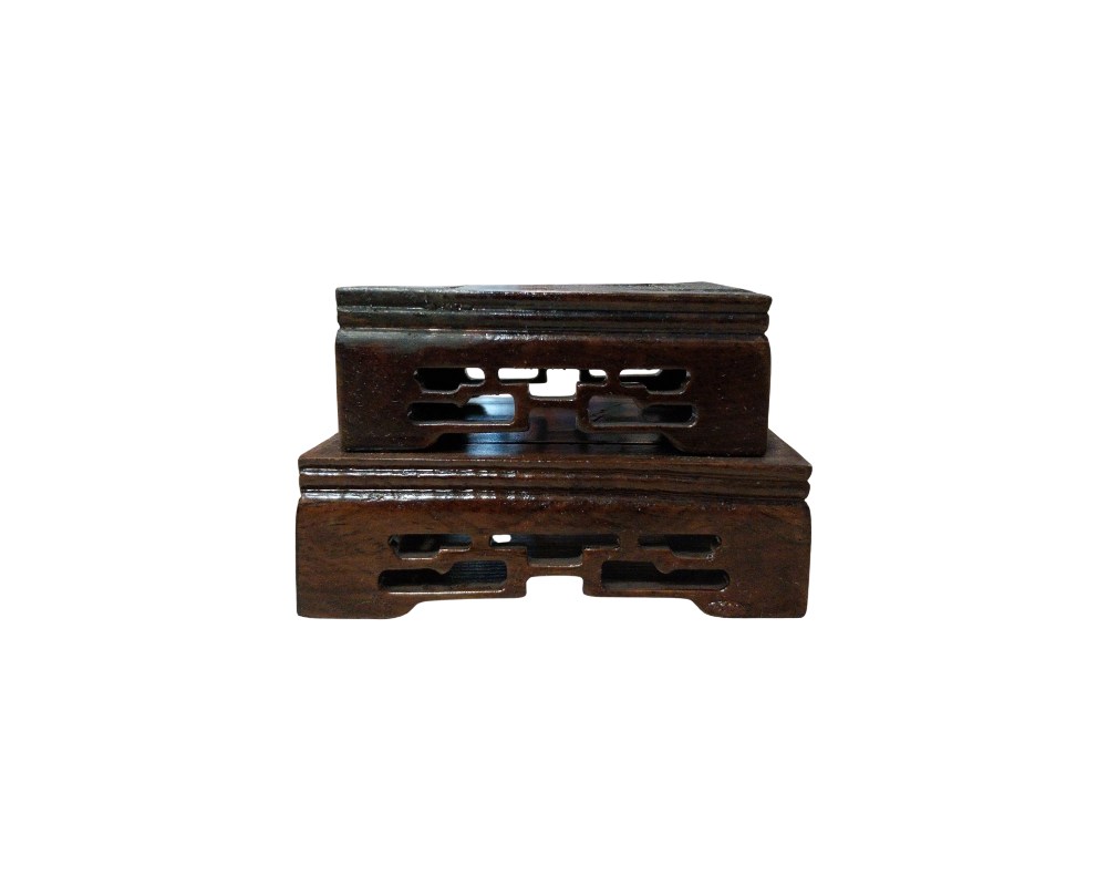 This set consists of two dark wooden display stands or pedestals, stacked one on top of the other. Available for hire for events, advertising, films and TV series