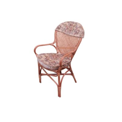 An elegant period chair with a wicker and woven rattan frame, featuring a padded seat and an upper backrest cushion, both upholstered in fabric with a classic floral print in earthy tones. Available for hire for events, advertising, films and TV series.