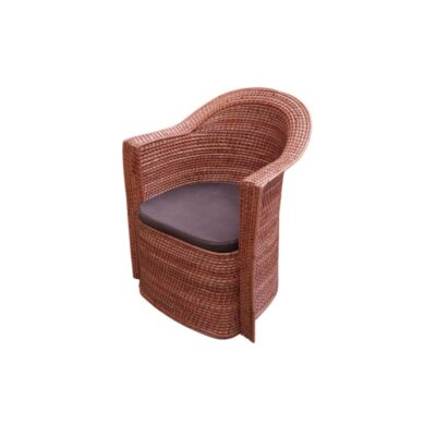An elegant vintage side chair, crafted entirely from a wraparound frame of woven natural wicker and rattan, featuring a comfortable seat cushion upholstered in a contrasting dark colour; available for hire for events, advertising, films and TV series