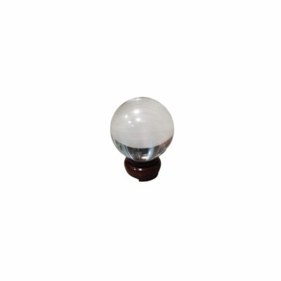 A decorative cut-glass sphere displaying interesting whitish veins or inclusions inside, presented on a small base; available for hire for events, advertising, films and TV series