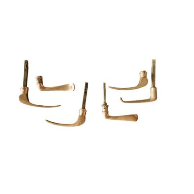 A lot comprising a set of vintage door handles, dating from around the 1950s and made of solid brass; available for hire for events, advertising, films and TV series