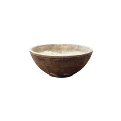 A small traditional ceramic bowl with a hemispherical design, characterised by an exterior finish in dark, earthy tones with subtle striations; available for hire for events, advertising, films and TV series