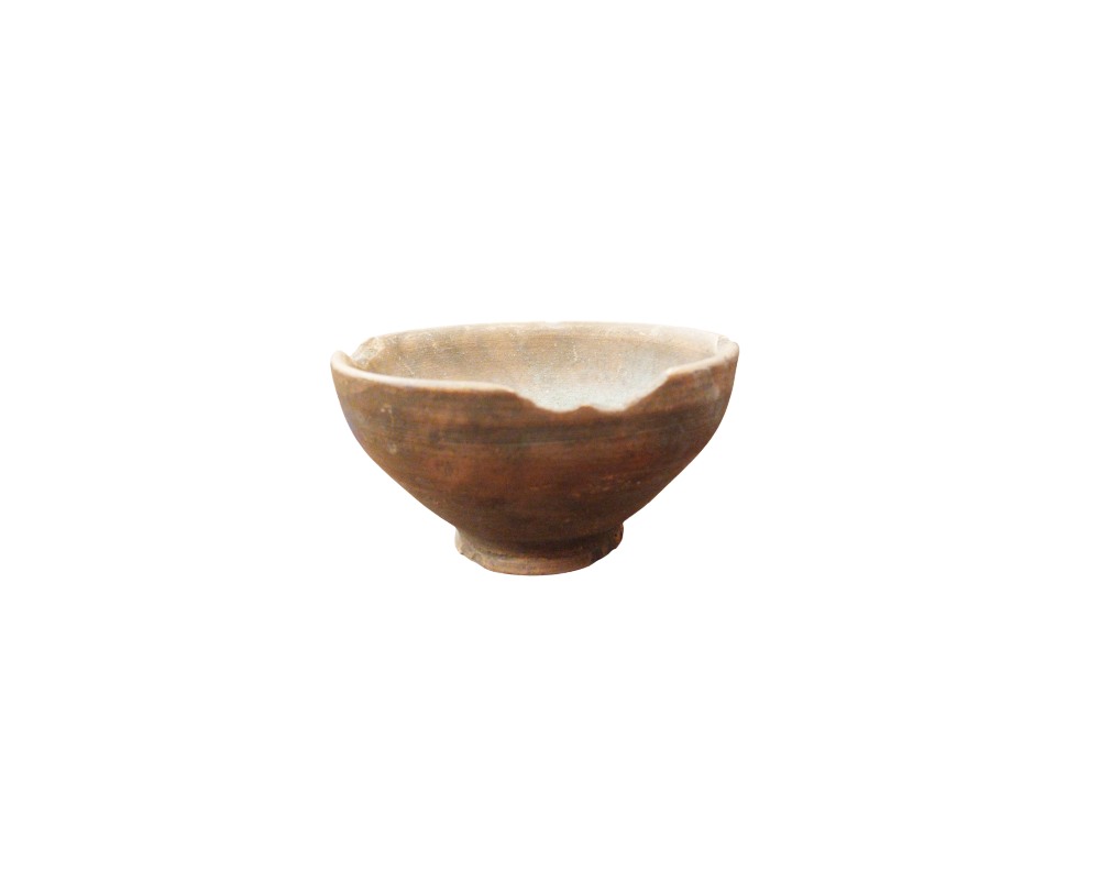 A small traditional ceramic bowl characterised by a globular body resting on a distinct ring-shaped base, in dark earthy tones; available for hire for events, advertising, films and TV series