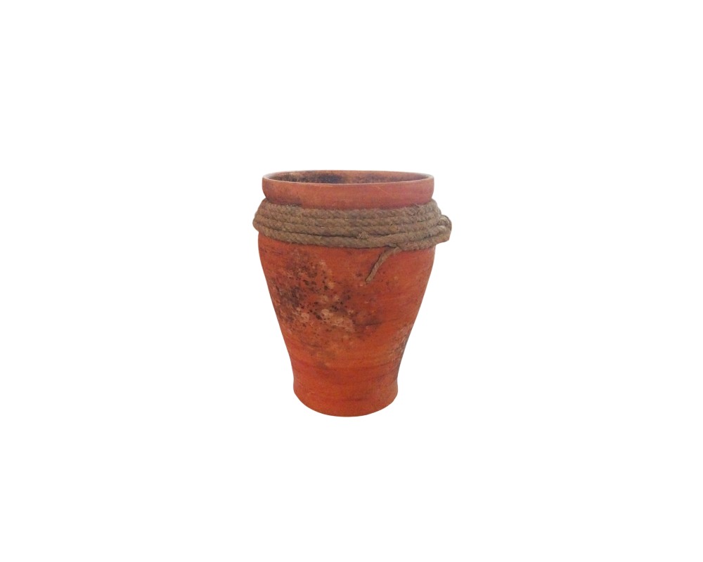 Terracotta-coloured ceramic plant pot with an aged finish and weathered textures – available for hire for events, advertising, films and TV series