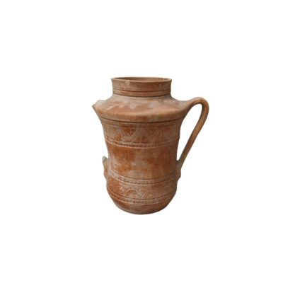 Terracotta ceramic jug in earthy tones, characterised by a sturdy cylindrical body, a practical side handle, a narrow neck and decorative bands featuring geometric relief engravings along its surface; available for hire for events, advertising, films and TV series