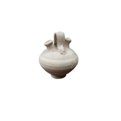 A traditional earthenware jug in the folk pottery style, with a globular body accentuated by a central moulding, resting on a small pedestal base – available for hire for events, advertising, films and TV series