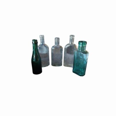 This collection comprises a select lot of five bottles and vials made of antique glass, dating from around the 1950s; available for hire for events, advertising, films and TV series