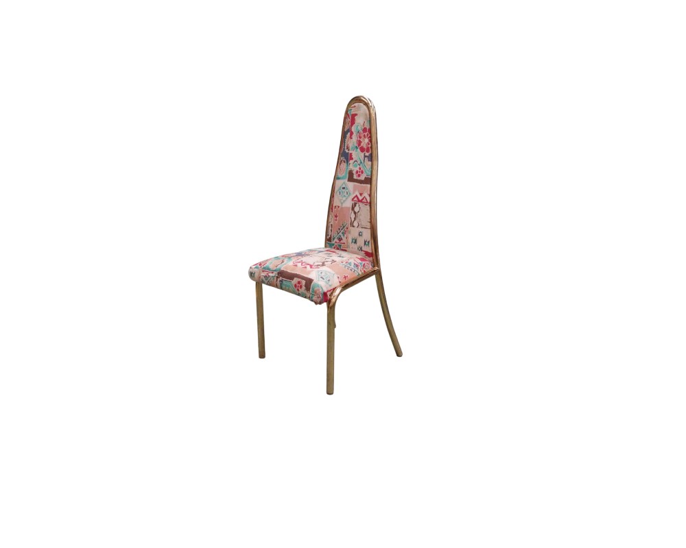 Vintage side chair, characterised by a seat and a distinctive high, tapered backrest, both padded and upholstered in fabric featuring a multicoloured geometric pattern in shades of pink and earth tones, and supported by a slender metal frame with a shiny gold finish. Available for hire for events, advertising, films and TV series.