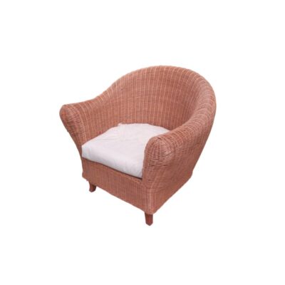 A cosy vintage side chair, made entirely from a wraparound frame of hand-woven natural wicker and rattan, featuring integrated armrests and a comfortable white seat cushion; available for hire for events, advertising, films and TV series