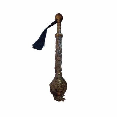 A traditionally designed, elongated metal object, characterised by a bulbous lower section and a handle sculpted with detailed reliefs of dragons and cloud motifs, topped at the upper end by a decorative dark-coloured tassel; available for hire for events, advertising, films and TV series