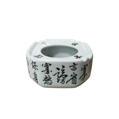 Square ceramic ashtray with rounded corners and fluted upper edges, finished in a glossy white glaze; available for hire for events, advertising, films and TV series