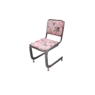 A modern-design side chair, characterised by a continuous cantilevered tubular metal frame (cantilever) with a chrome finish, and a seat and separate backrest, both padded and upholstered in fabric featuring a delicate floral print in shades of pink and grey; available for hire for events, advertising, films and TV series