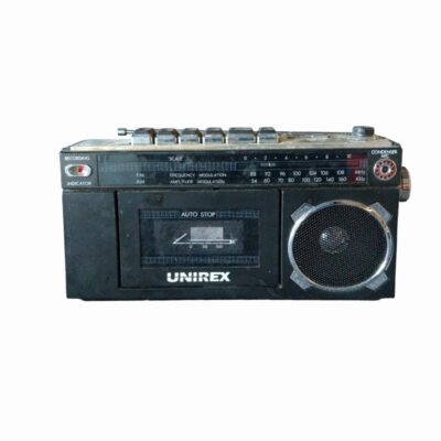 Classic portable Unirex cassette radio, designed for analogue audio playback and tuning into AM/FM radio stations; available for hire for events, advertising, films and TV series