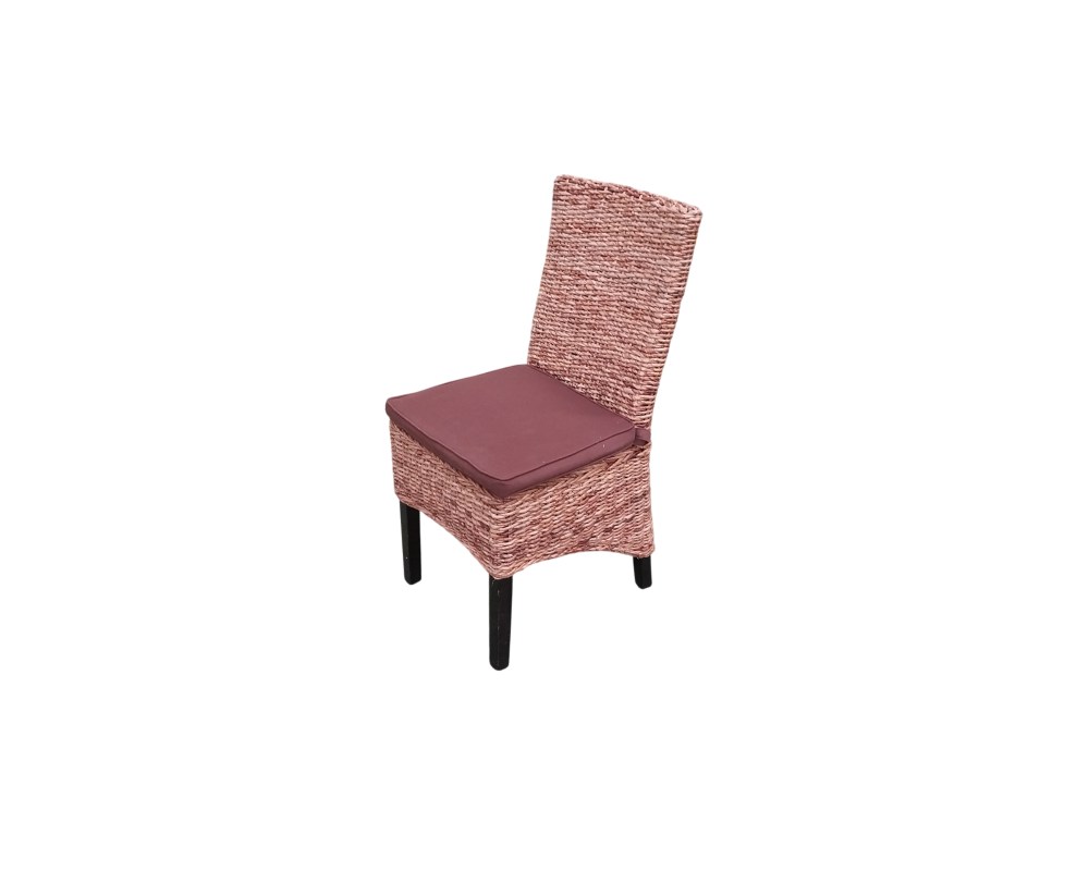 An elegant vintage side chair, characterised by a compact body entirely covered with a fine, tightly woven wickerwork on the seat and backrest, fitted with a comfortable seat cushion in a dark brown shade and supported by four sturdy wooden legs. Available for hire for events, advertising, films and TV series