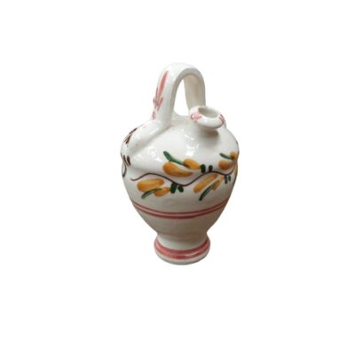 A small glazed ceramic jug in a traditional style, characterised by a tall, slender base, a bulbous body with a handle at the top and a spout, all hand-decorated with floral and plant motifs in shades of yellow, green and reddish tones against a light background. Available for hire for events, advertising, films and TV series.