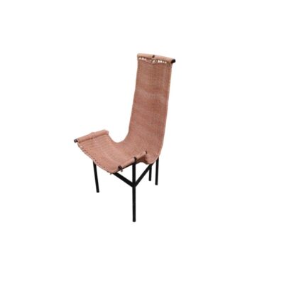 A modern vintage side chair, characterised by a seamless, ergonomic body, upholstered or covered in esparto grass; available for hire for events, advertising, films and TV series