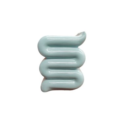 The Whip Side Table is a piece of contemporary design that stands out for its sculptural and minimalist aesthetic. With its distinctive sinuous, pleated shape, this piece of furniture not only serves a practical purpose but also acts as an eye-catching decorative feature in any room, ideal for modern spaces seeking a touch of avant-garde design – available for hire for events, advertising, films and TV series.