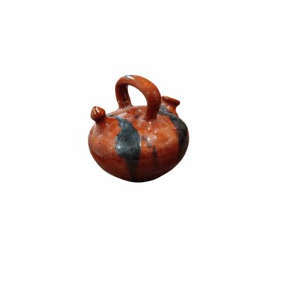 small ceramic jug with a globular, flattened body, featuring an upper bridge-style handle, a spout and a side pouring opening; available for hire for events, advertising, films and TV series
