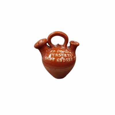 Traditional ceramic jug with a globular body and narrow base, featuring an upper bridge-style handle, a spout and a piece with holes – available for hire for events, advertising, films and TV series